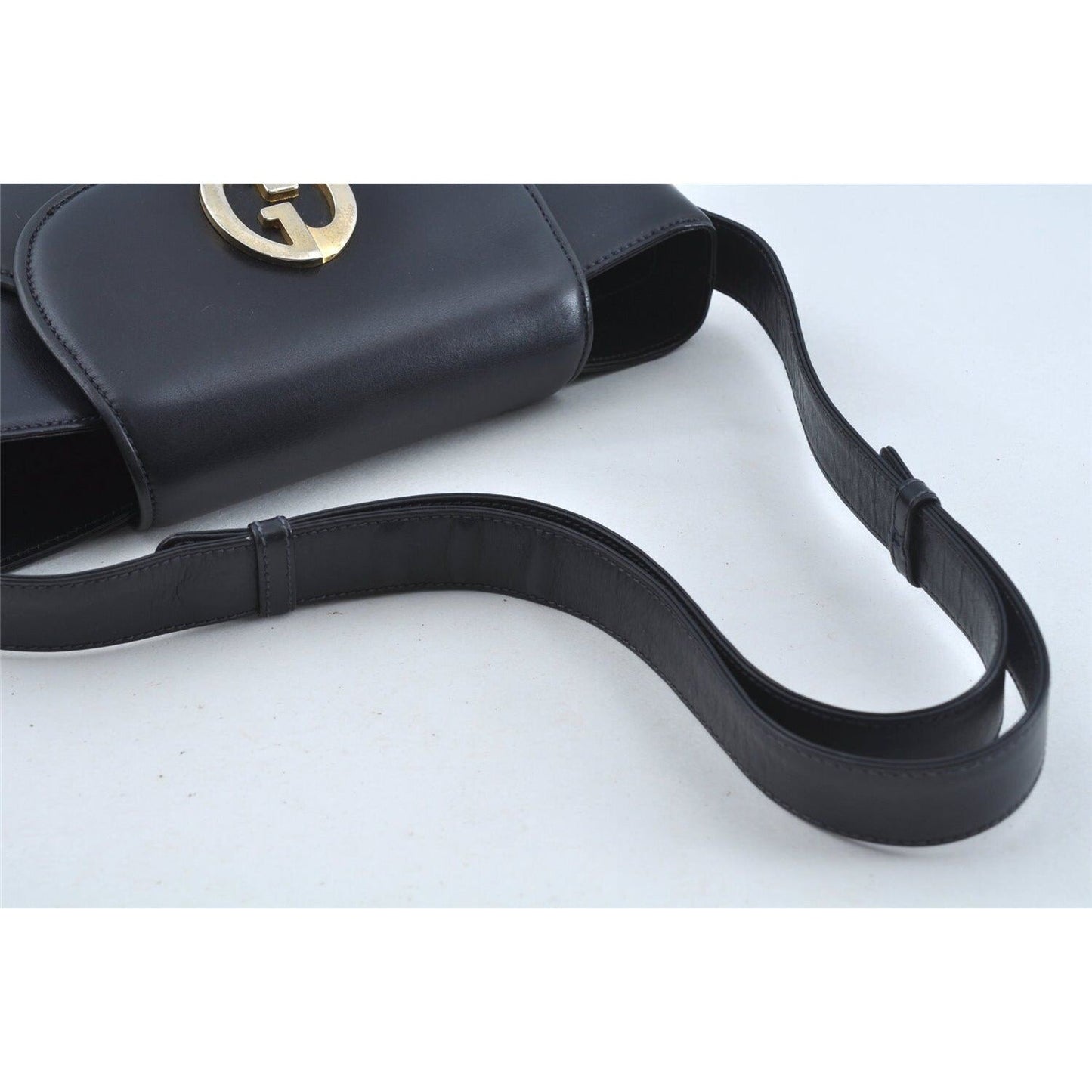 Gucci 1973 navy leather roomy handbag with a gold GG snap