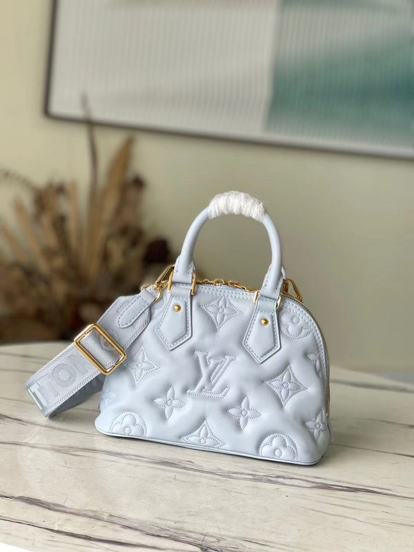 Alice Bags- Louis Vuittons  - 16617