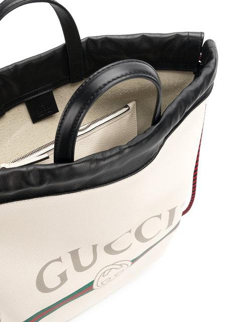 Gucci Logo-Print Drawstring Backpack in White