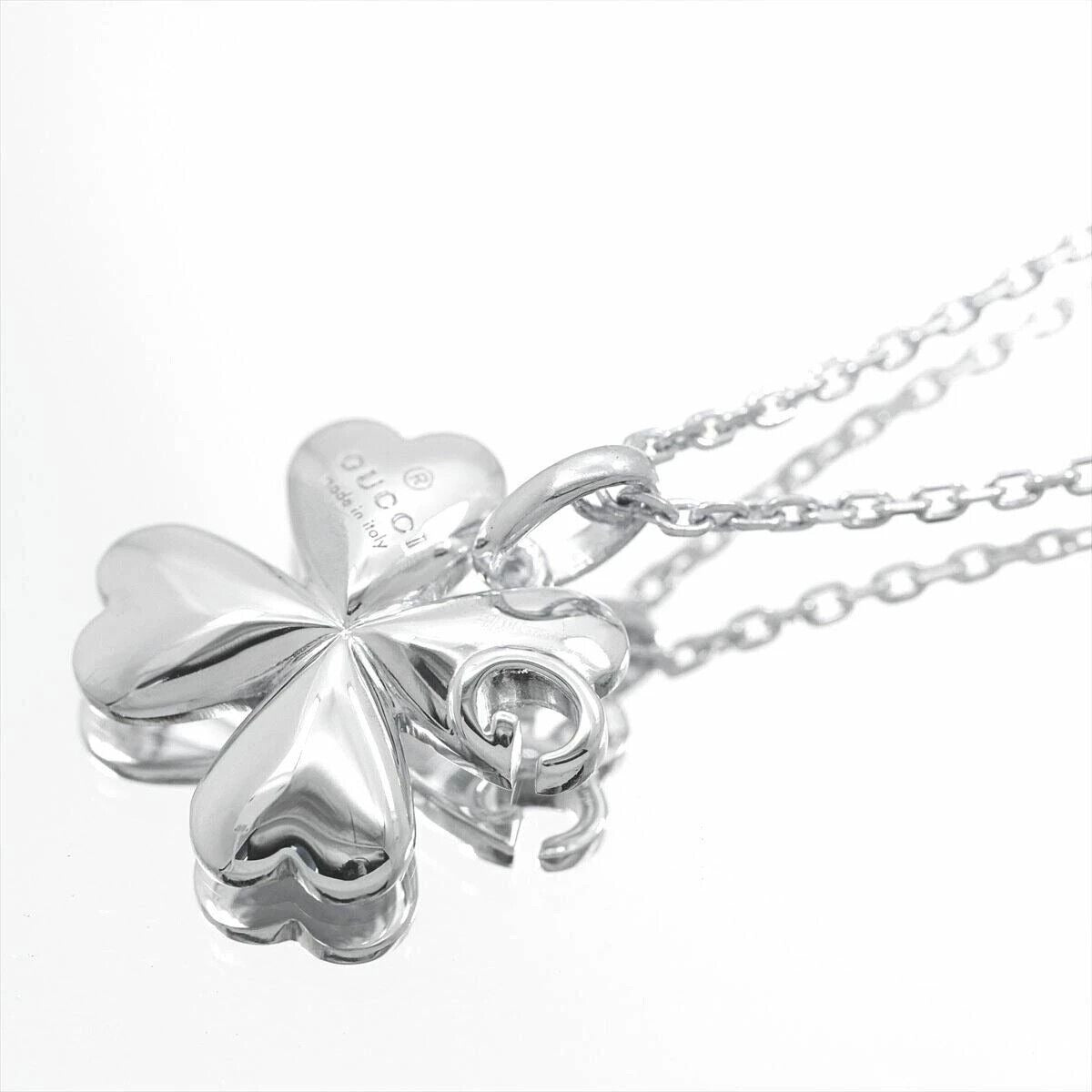 Gucci sterling silver four leaf clover pendant with G logo cut-out on an 18" chain
