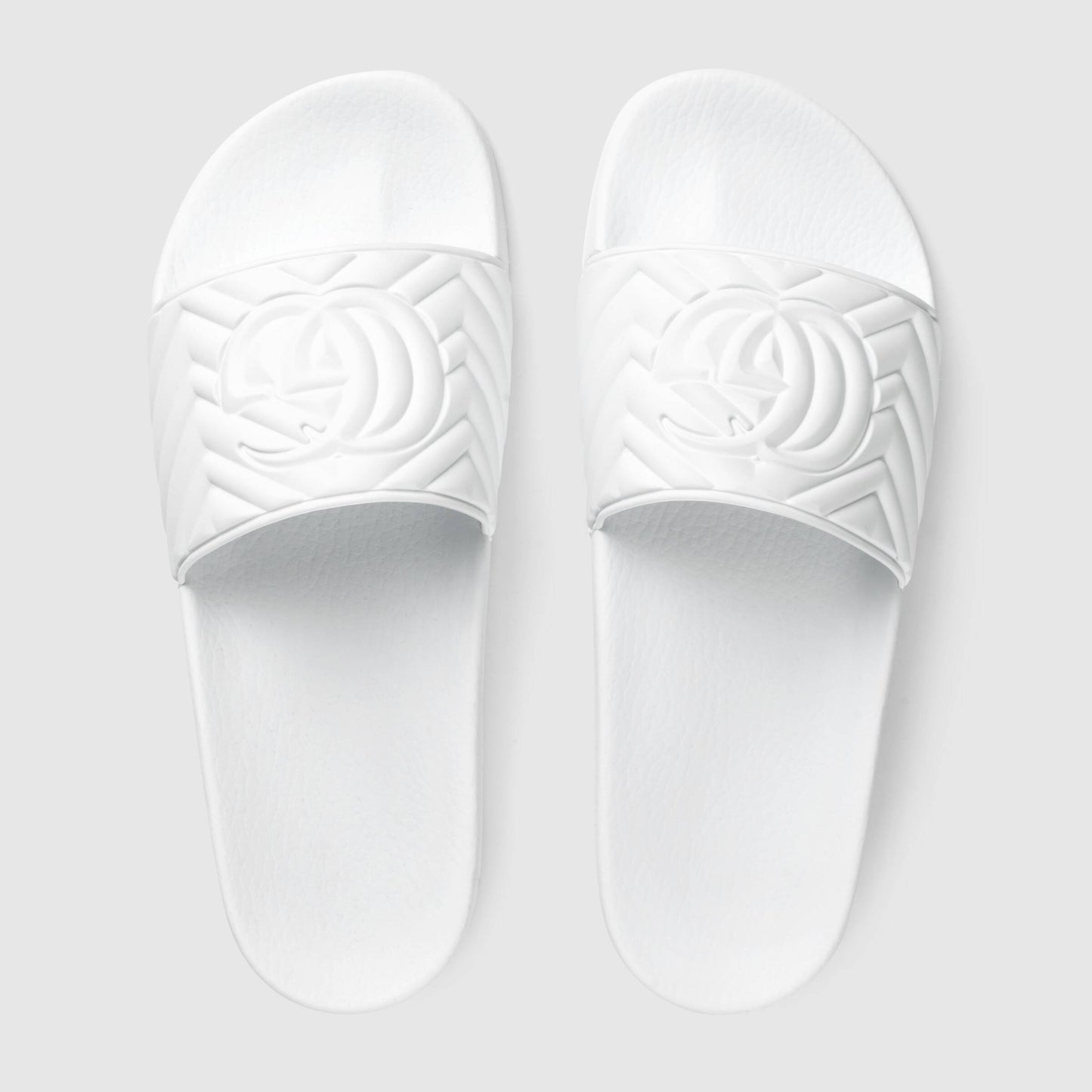Gucci Matelassé Rubber Slides In White