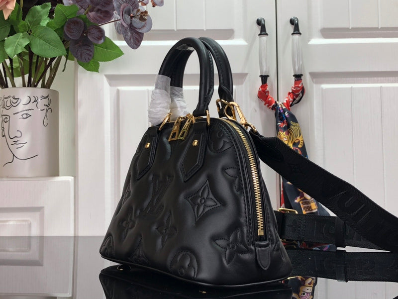 Alice Bags- Louis Vuittons  - 16731