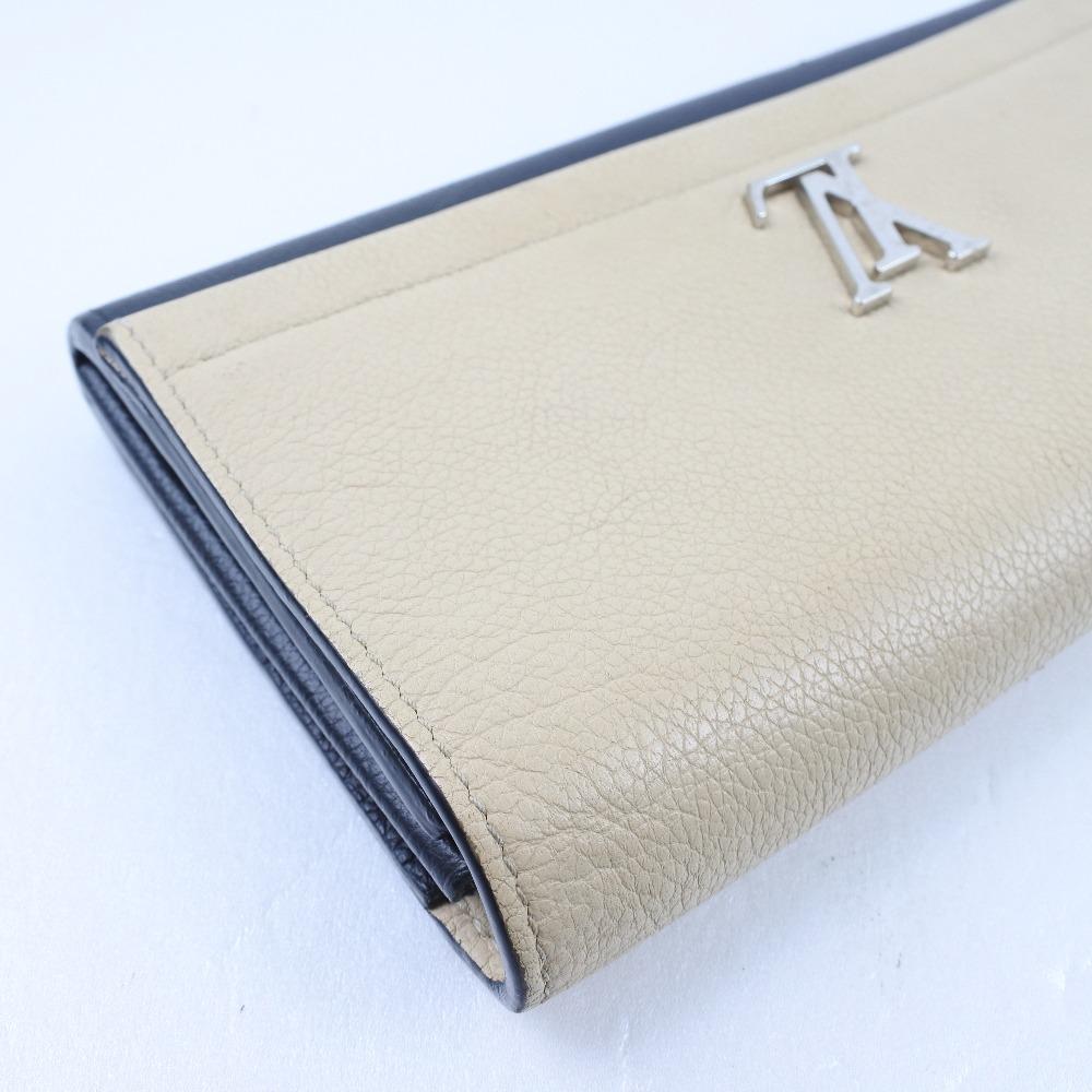 Louis Vuitton Beige Leather Lockme wallet accessories