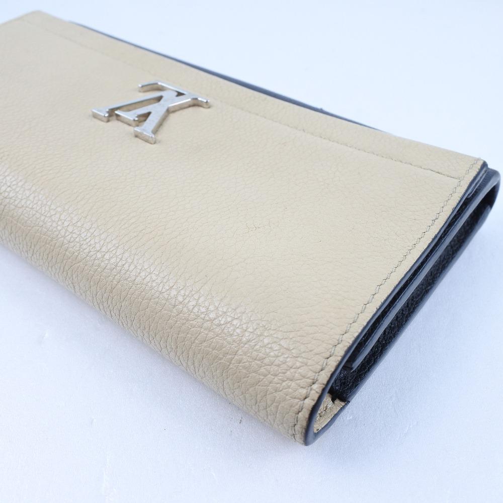 Louis Vuitton Beige Leather Lockme wallet accessories