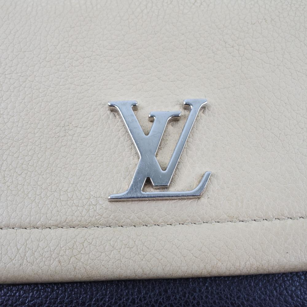 Louis Vuitton Beige Leather Lockme wallet accessories