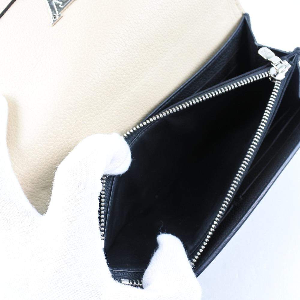 Louis Vuitton Beige Leather Lockme wallet accessories