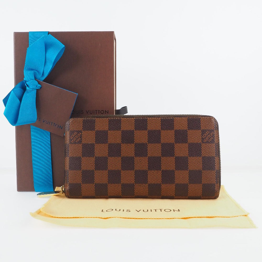 Louis Vuitton Brown Canvas Portefeuille zippy wallet accessories