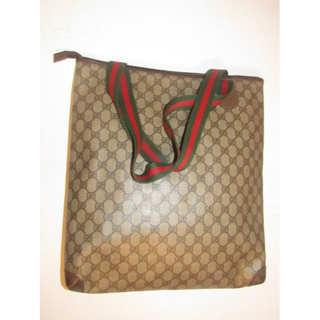 Gucci Vintage Leather And Large G Logo Print Coated Canvas In Shades Of Brown