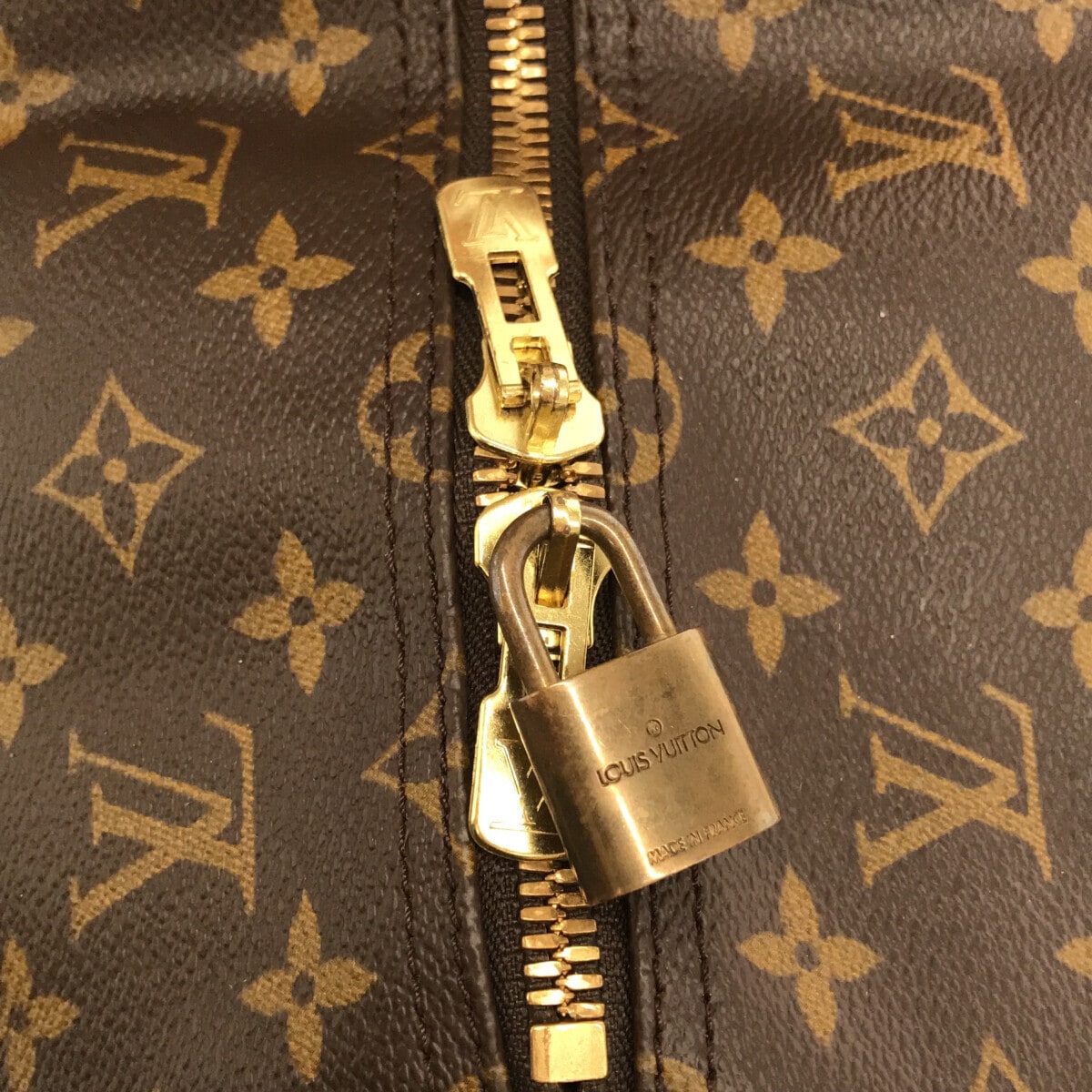 Louis Vuitton Brown Canvas Keepall Bandouli√®re 55 travel bag