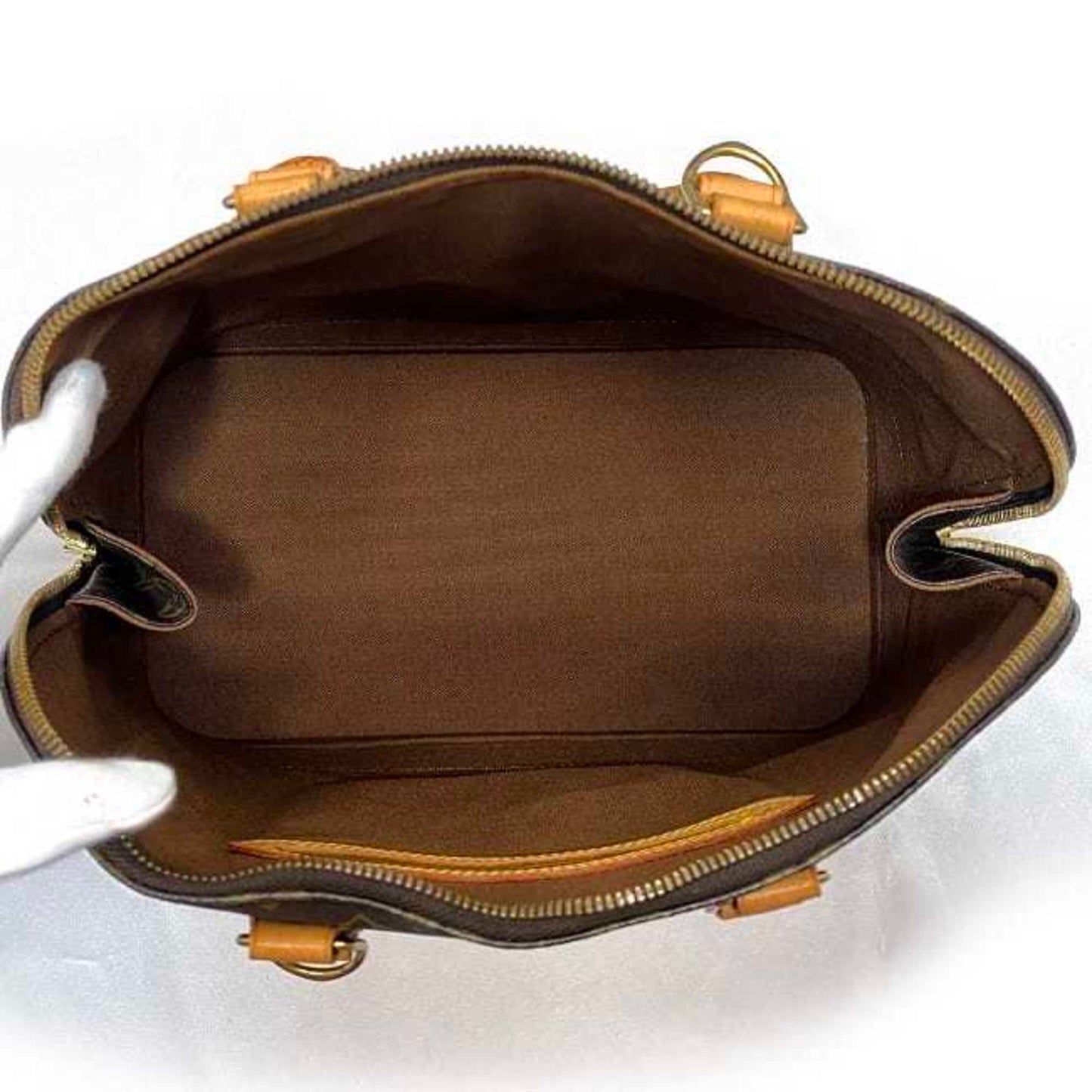 LOUIS VUITTON Alma Handbag