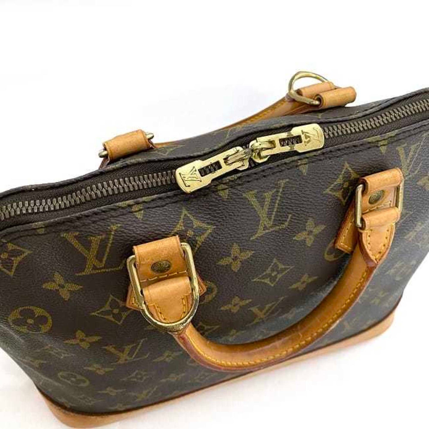 LOUIS VUITTON Alma Handbag