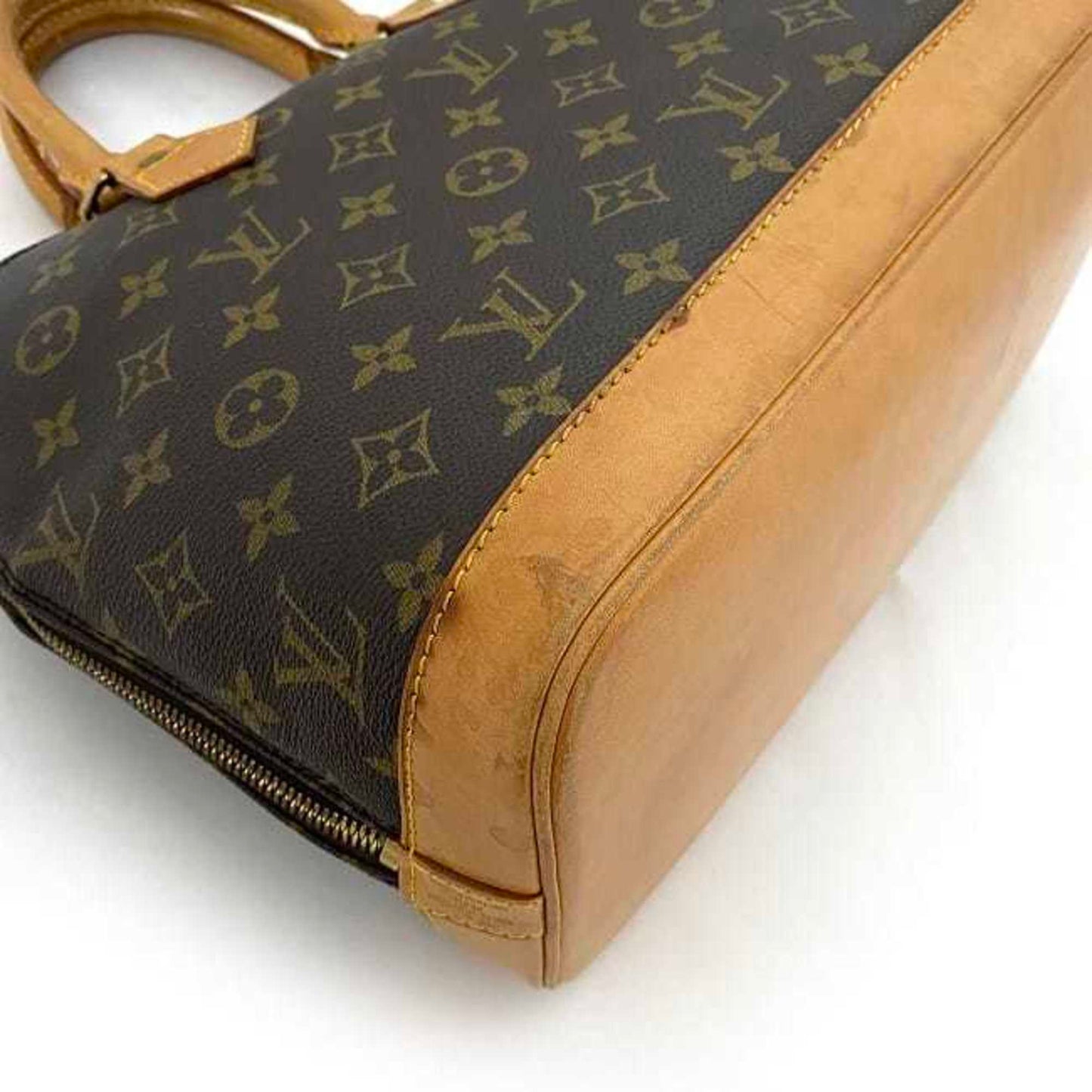 LOUIS VUITTON Alma Handbag