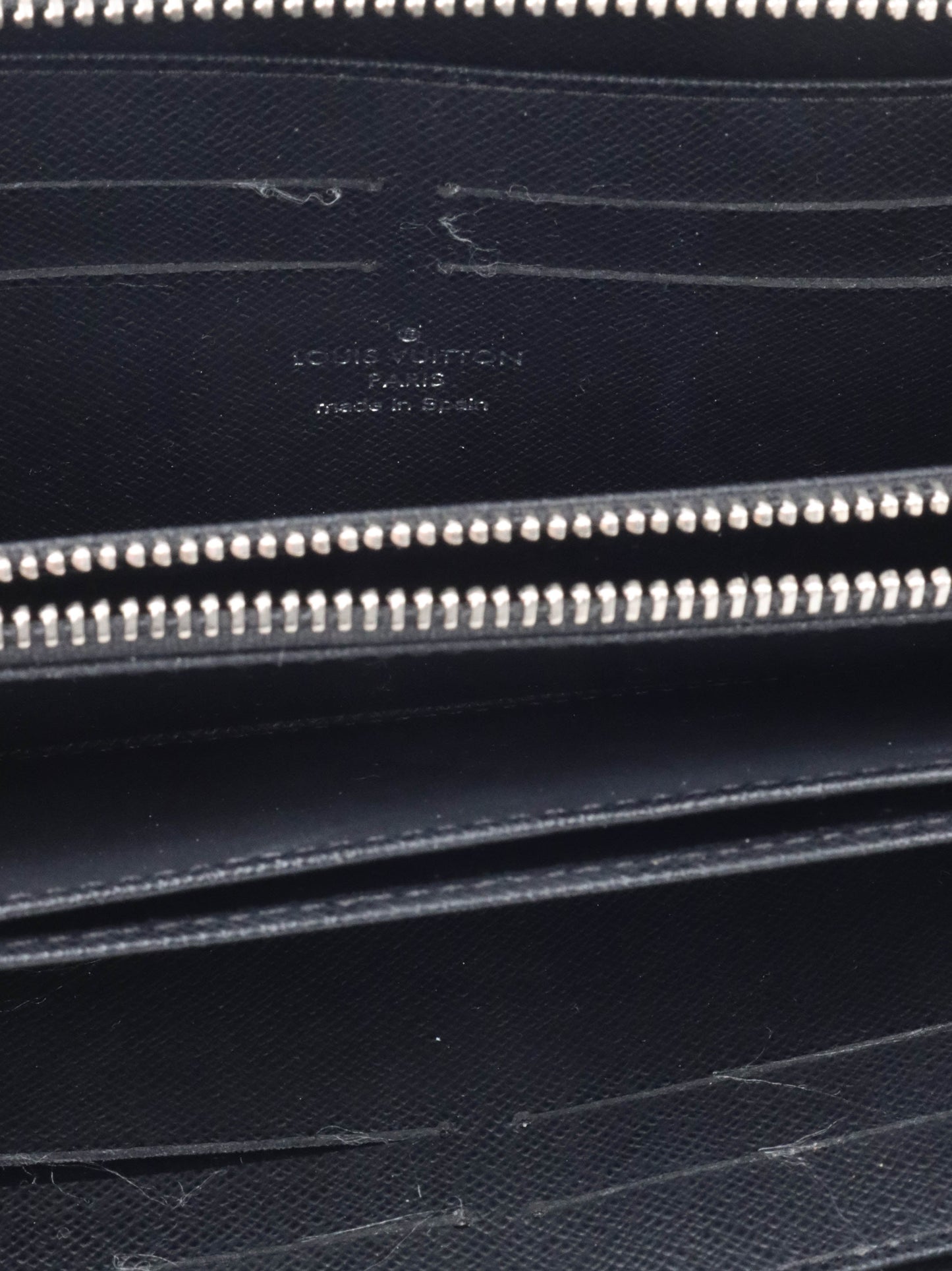 Louis Vuitton Black EPI Zipped Wallet.
