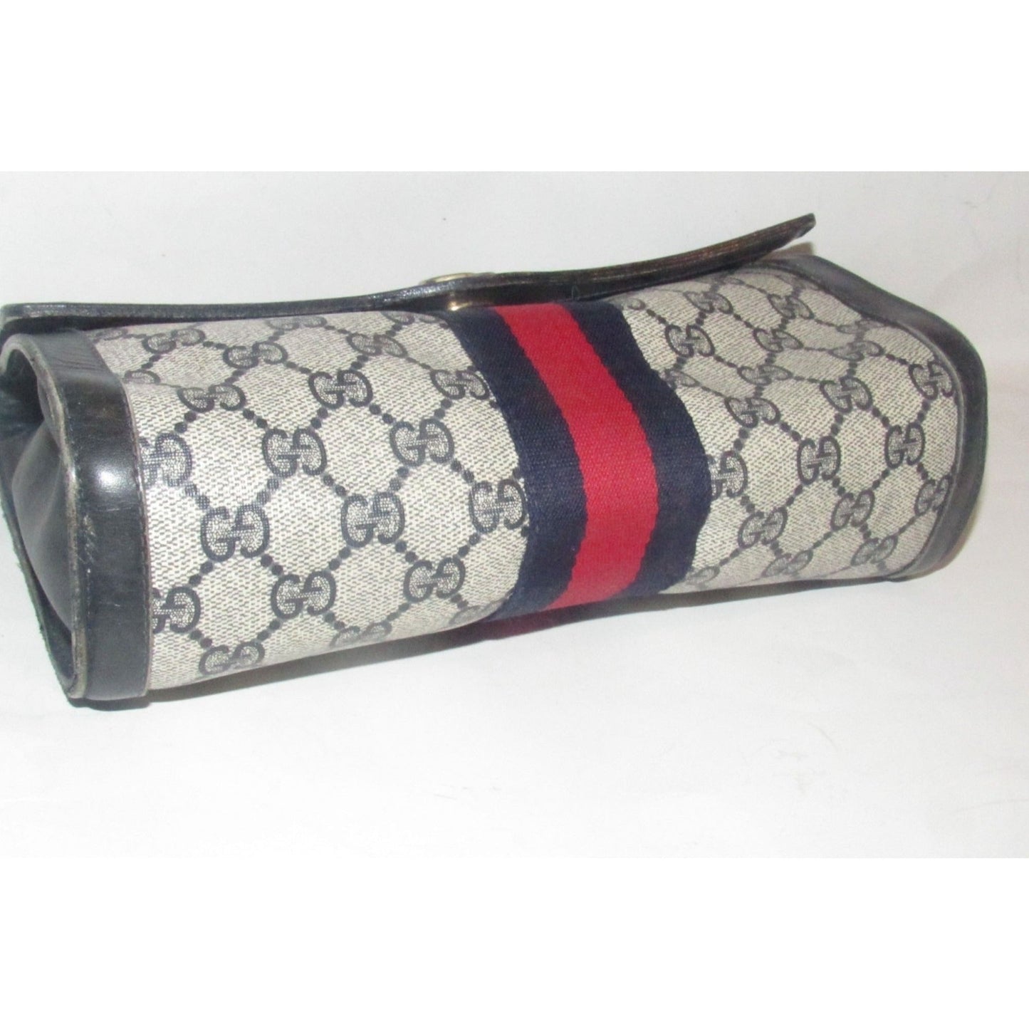 Gucci, navy Guccissima print coated canvas & leather, clutch or cosmetic bag with a red & blue Sherry striped center and envelope top