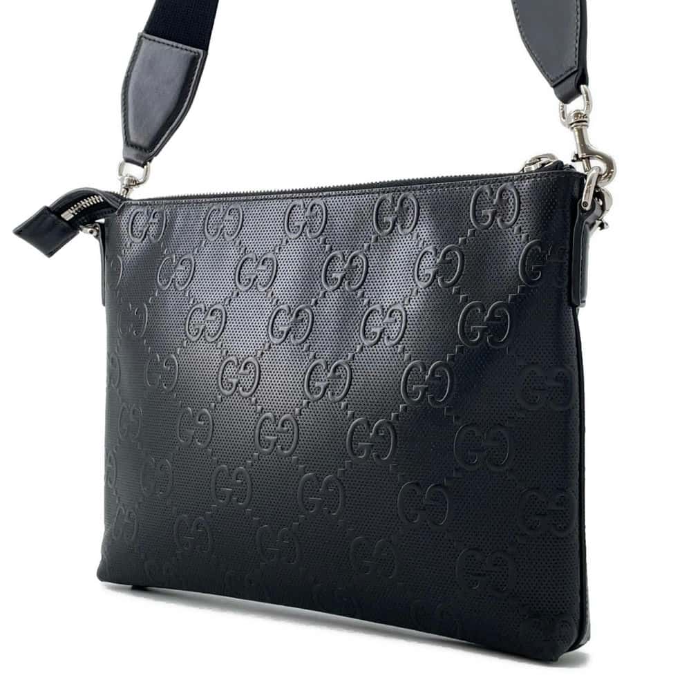 GUCCI GG-embossed messenger bag Black 696009 Leather