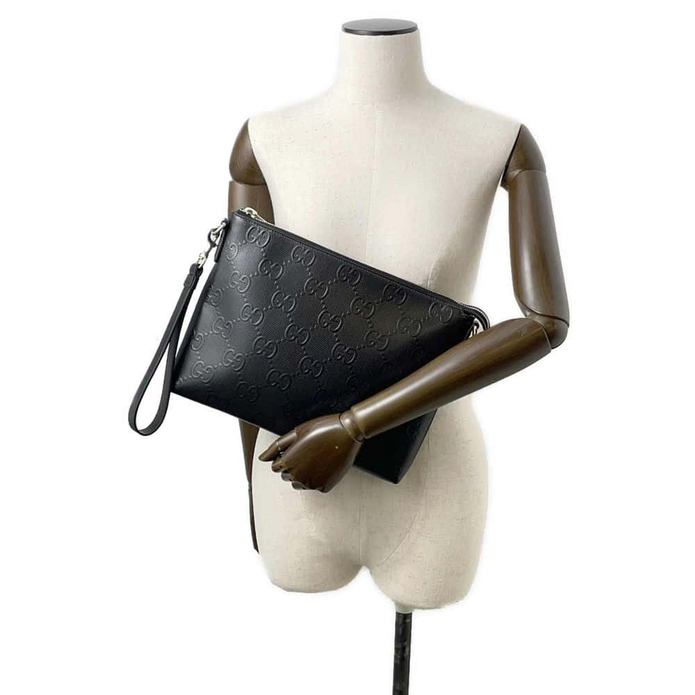 GUCCI GG-embossed messenger bag Black 696009 Leather
