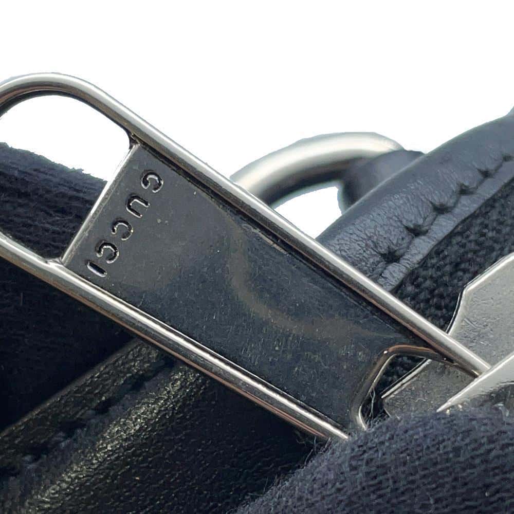 GUCCI GG-embossed messenger bag Black 696009 Leather