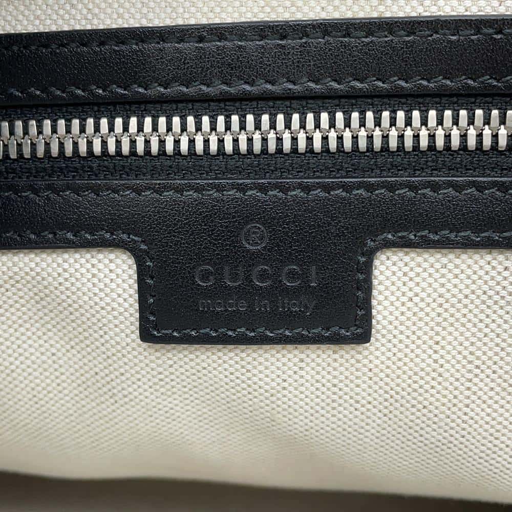 GUCCI GG-embossed messenger bag Black 696009 Leather