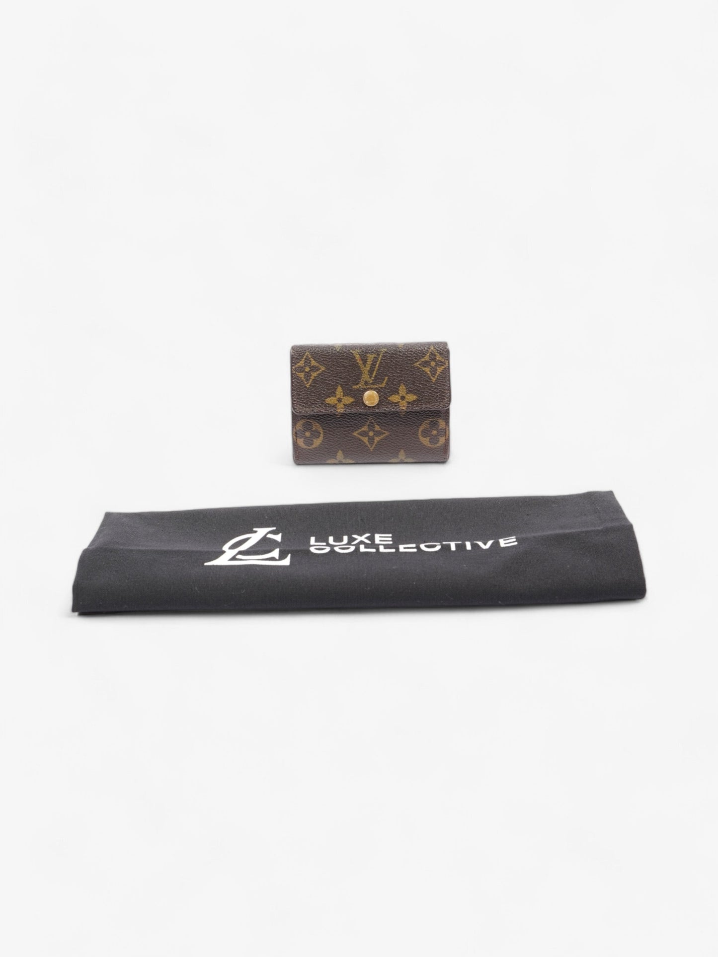 Louis Vuitton Fold Over Wallet Monogram Coated Canvas