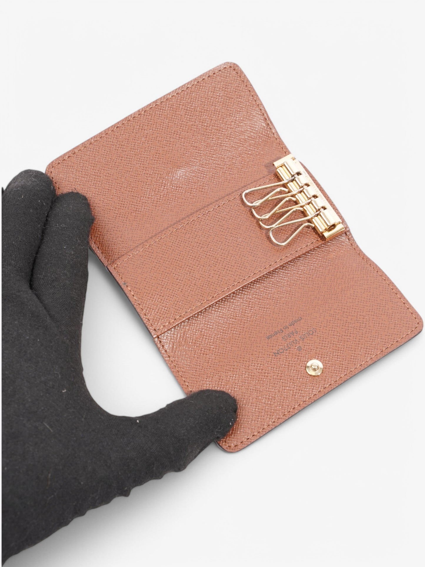 Louis Vuitton 4 Key Holder Monogram Coated Canvas
