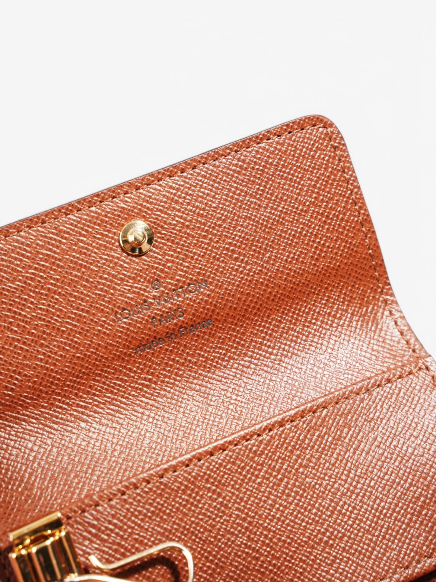 Louis Vuitton 4 Key Holder Monogram Coated Canvas