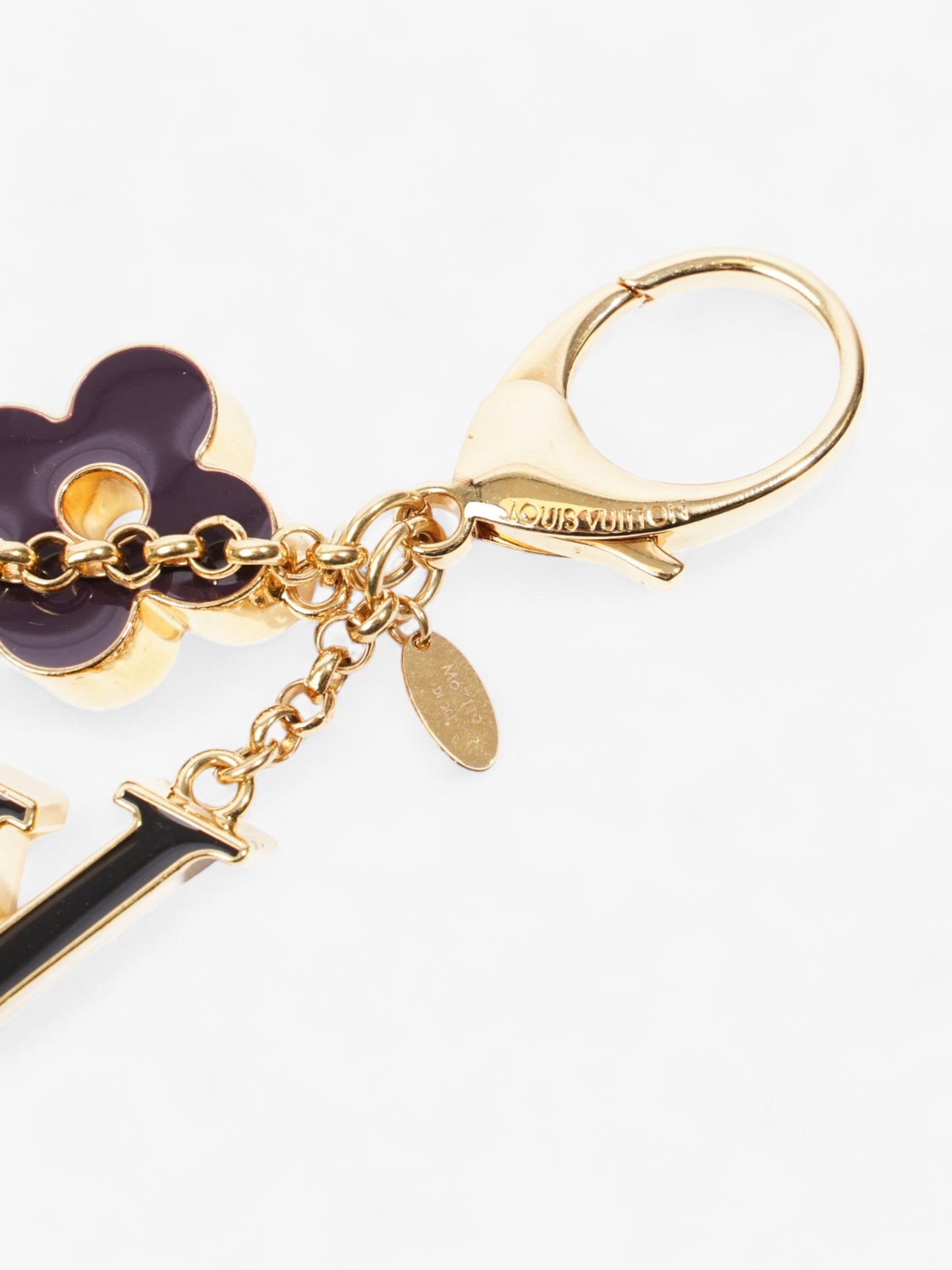 Louis Vuitton Fleur De Monogram Bag Charm Gold / Black / Beige Base Metal