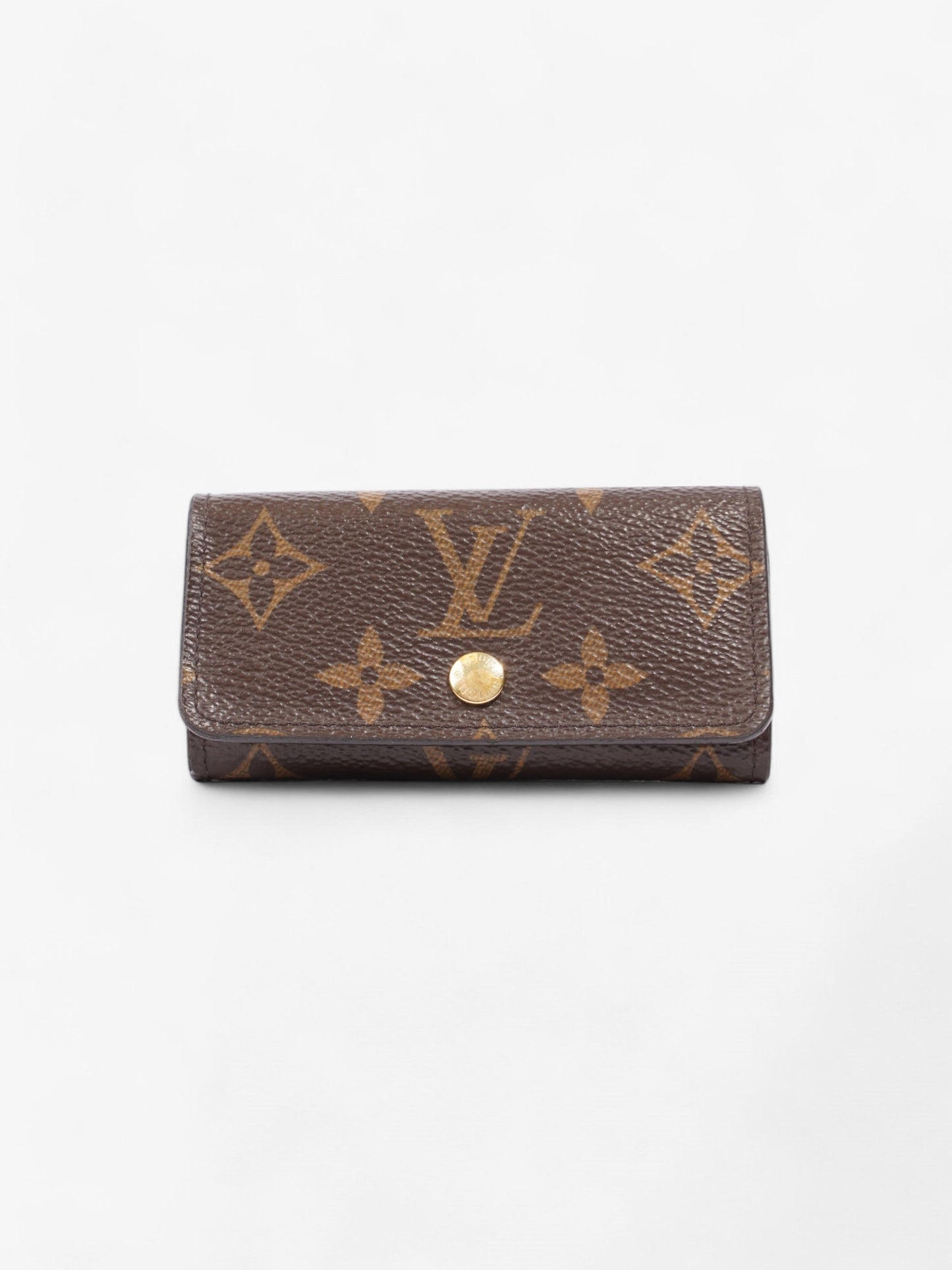 Louis Vuitton 4 Key Holder Monogram / Gold Coated Canvas