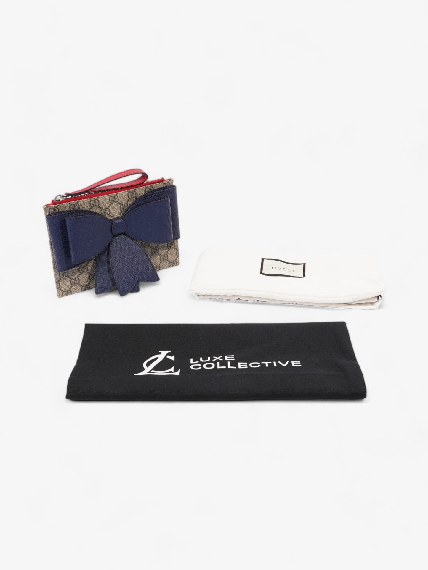 Gucci GG Bow Wristlet GG Supreme / Blue / Red Coated Canvas