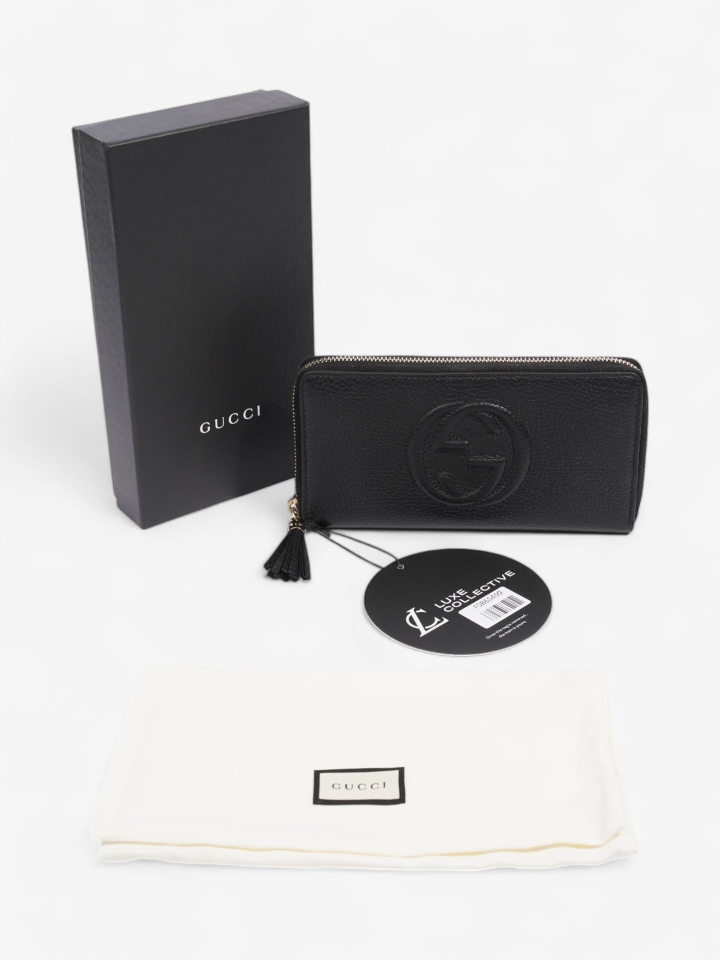 Gucci Soho Interlocking G Tassel Round Long Wallet Black / Light Gold Leather