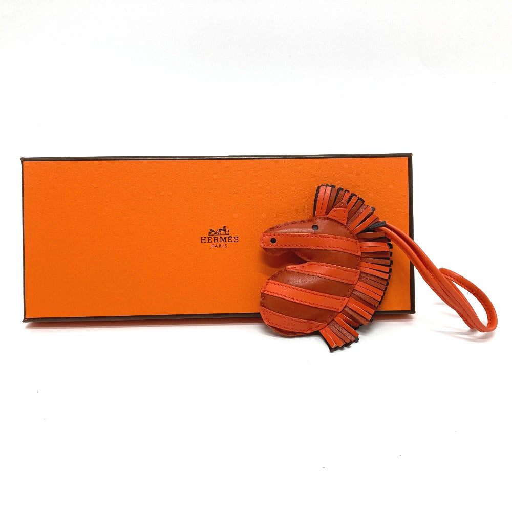 HERMES Bag charm lambskin Orange type zebra Gee Gee Savannah
