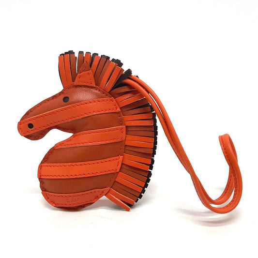 HERMES Bag charm lambskin Orange type zebra Gee Gee Savannah