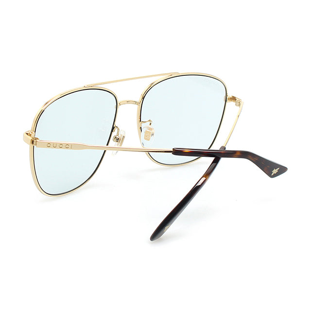 Gucci Metal Framed Navigator Sunglasses in Gold