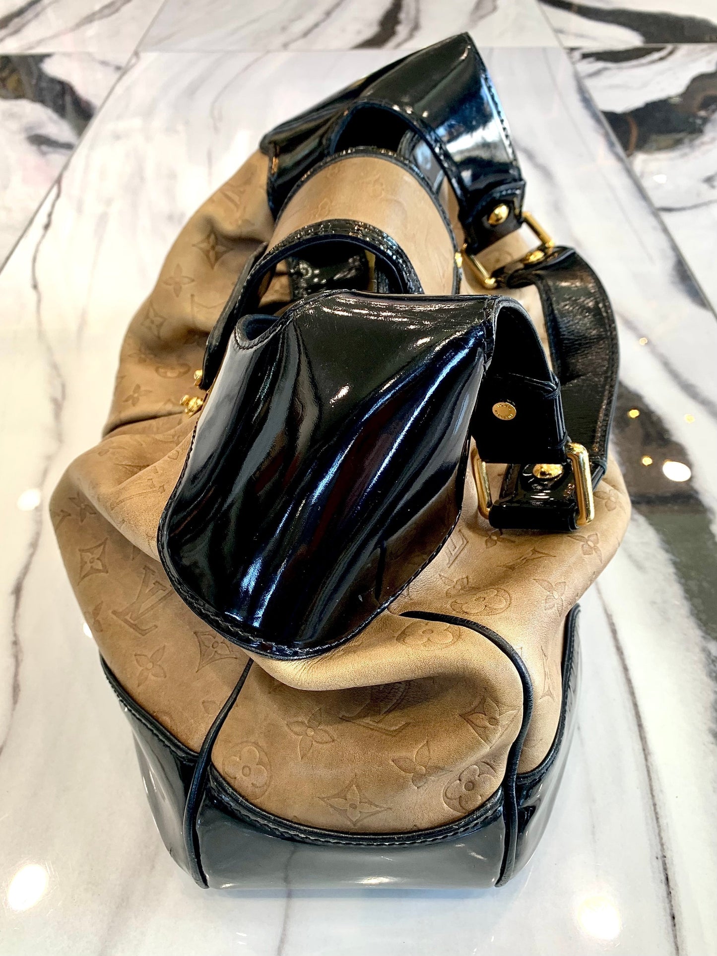 LOUIS VUITTON EMBOSSED POLLY HOBO BAG