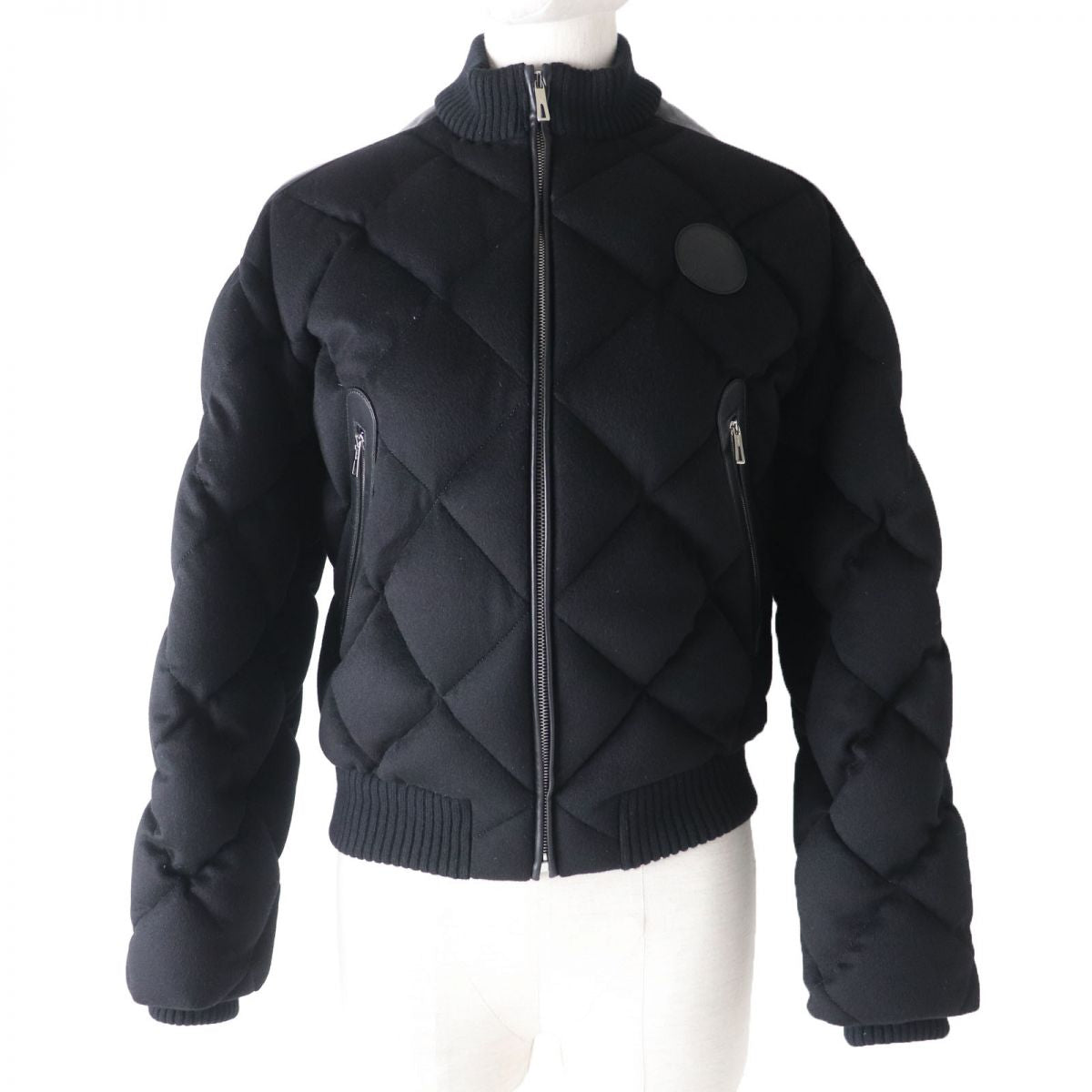 HERMES Down jacket Main: 100% cashmere, Part: Sheepskin, Part: Leather, Filling: 90% down, Filling: 10% feather, Rib part: 90% cashmere, 9% nylon, 1% polyurethane, Part: 100% polyester black Women 34 Used