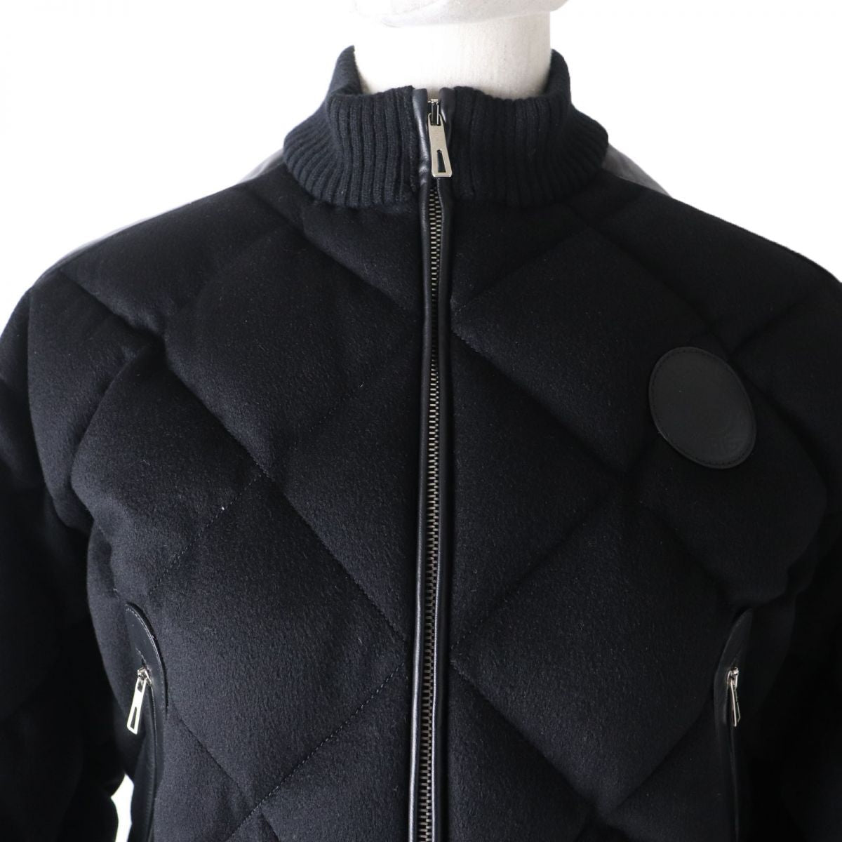 HERMES Down jacket Main: 100% cashmere, Part: Sheepskin, Part: Leather, Filling: 90% down, Filling: 10% feather, Rib part: 90% cashmere, 9% nylon, 1% polyurethane, Part: 100% polyester black Women 34 Used