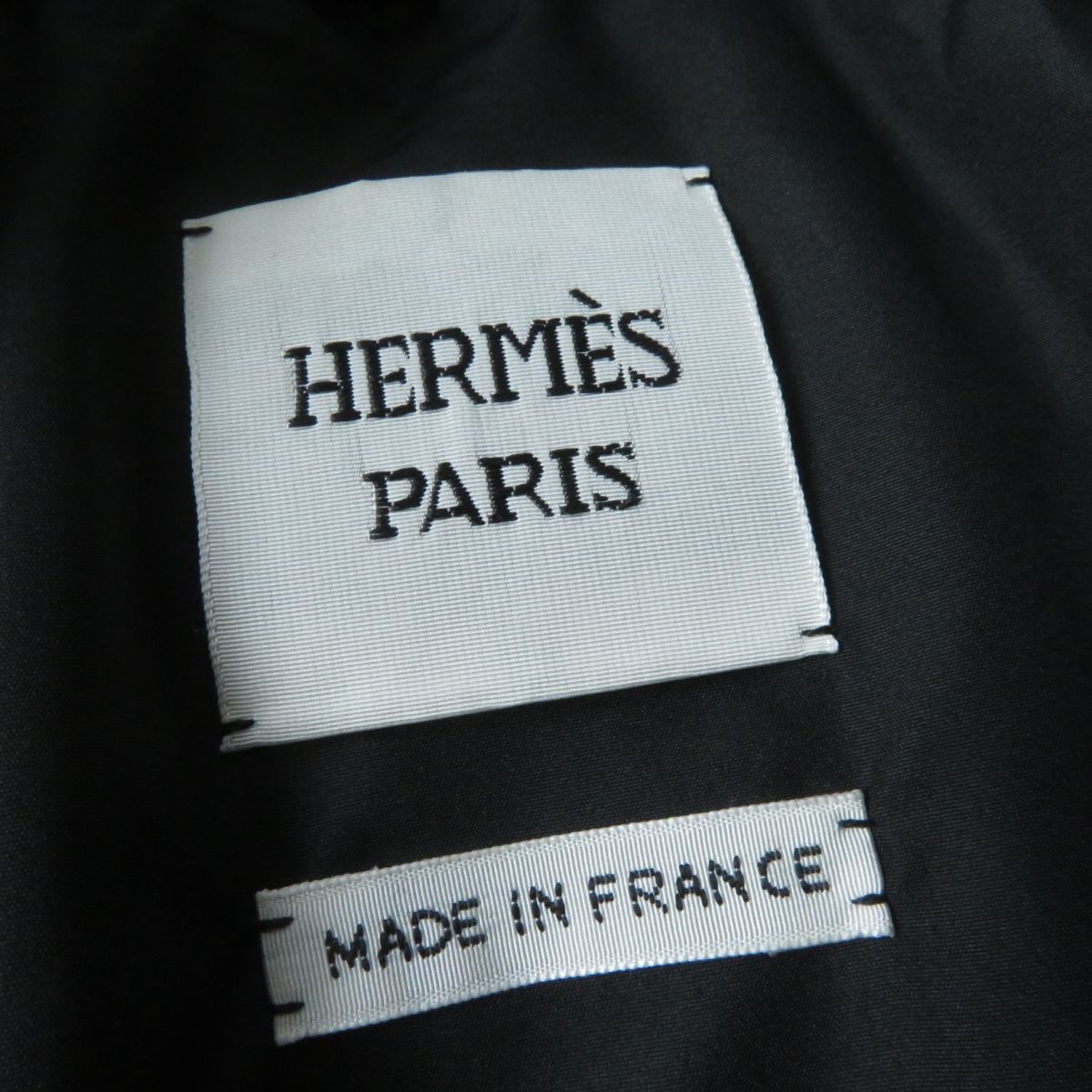 HERMES Down jacket Main: 100% cashmere, Part: Sheepskin, Part: Leather, Filling: 90% down, Filling: 10% feather, Rib part: 90% cashmere, 9% nylon, 1% polyurethane, Part: 100% polyester black Women 34 Used