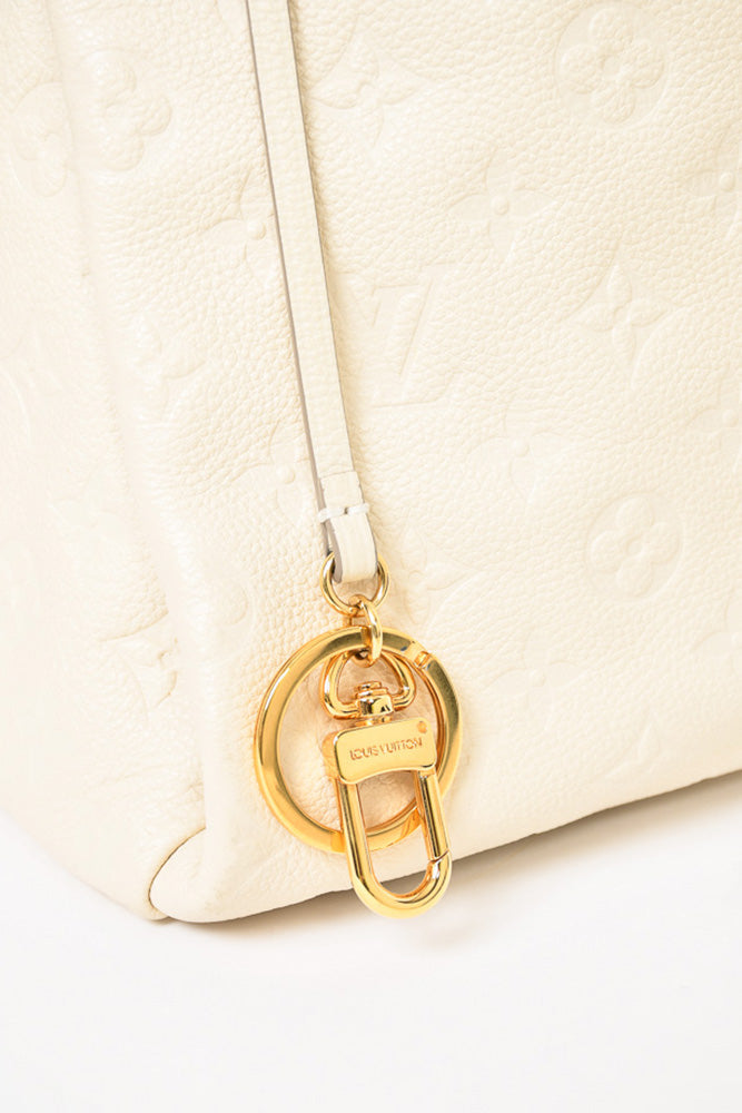 Louis Vuitton 2012 Cream Empreinte Leather Artsy MM Hobo Bag