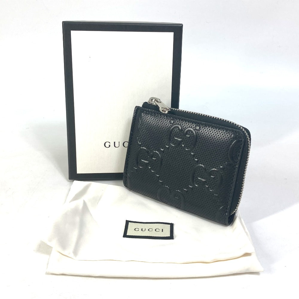 GUCCI Coin case 657571 leather black GG emboss L-shaped fastener mens Used