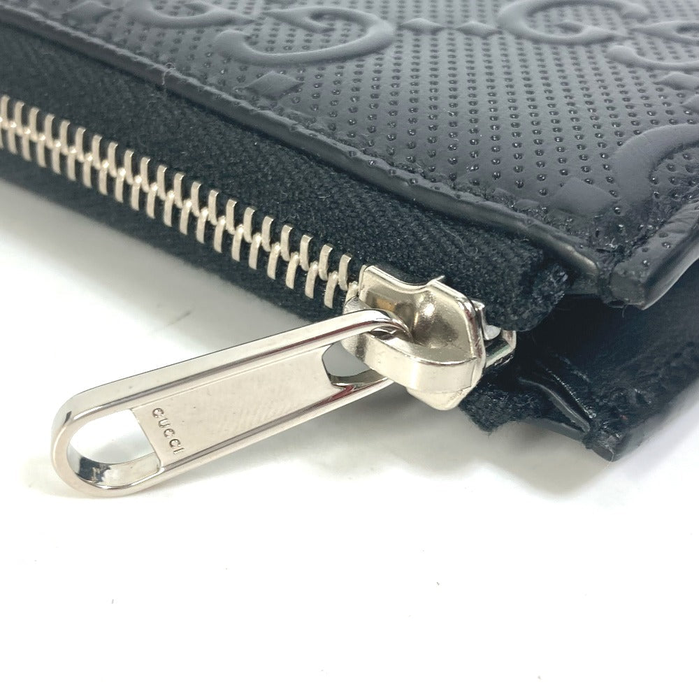 GUCCI Coin case 657571 leather black GG emboss L-shaped fastener mens Used