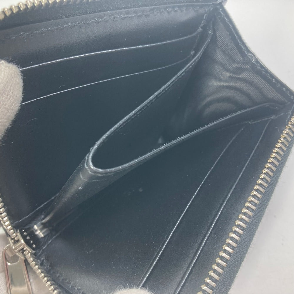 GUCCI Coin case 657571 leather black GG emboss L-shaped fastener mens Used
