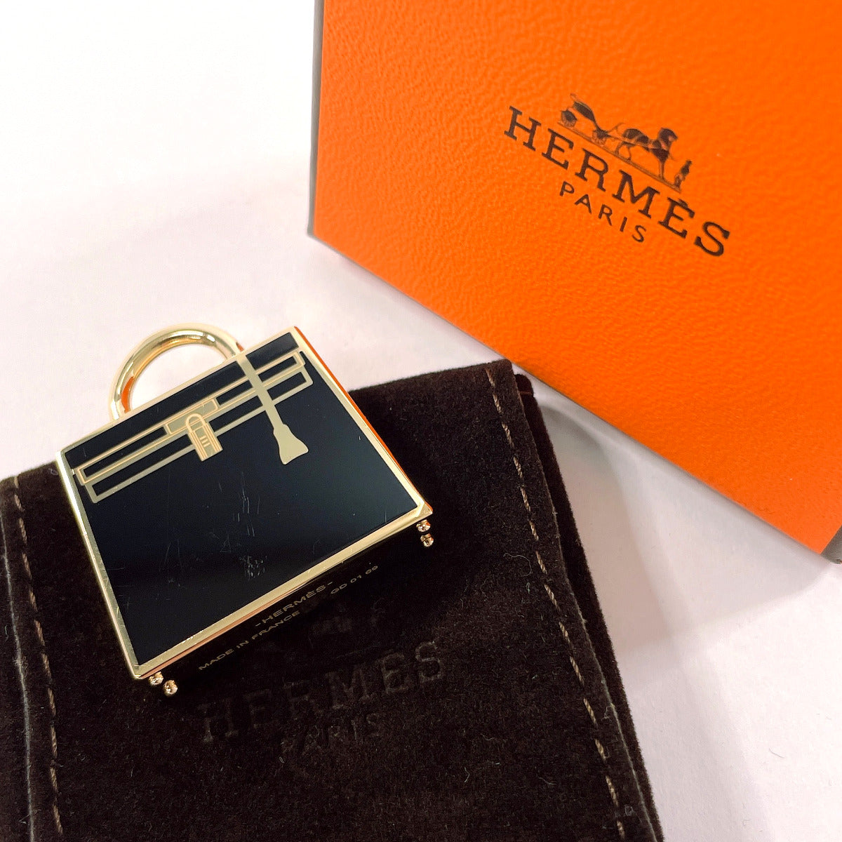 HERMES charm metal gold Curio Jite Kelly