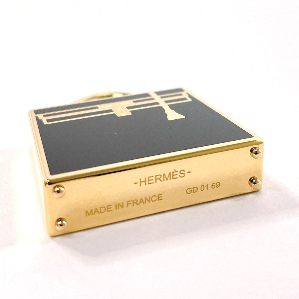 HERMES charm metal gold Curio Jite Kelly