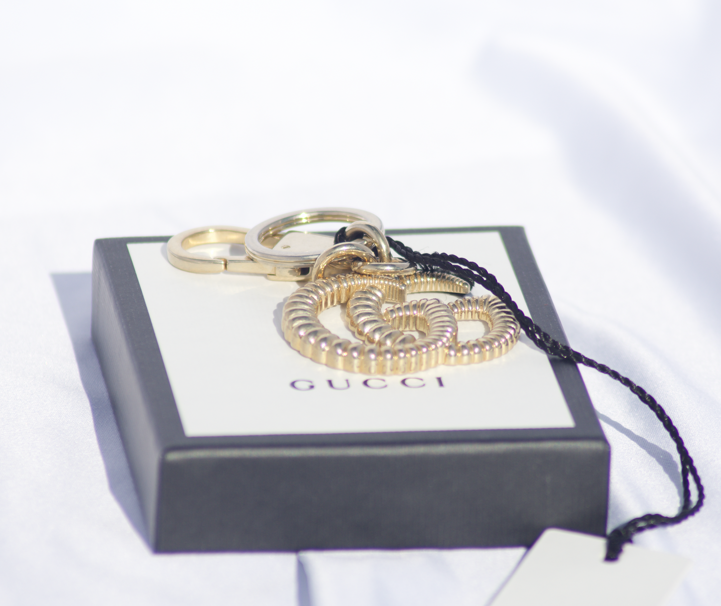 Gucci Interlocking GG Brass Key Ring