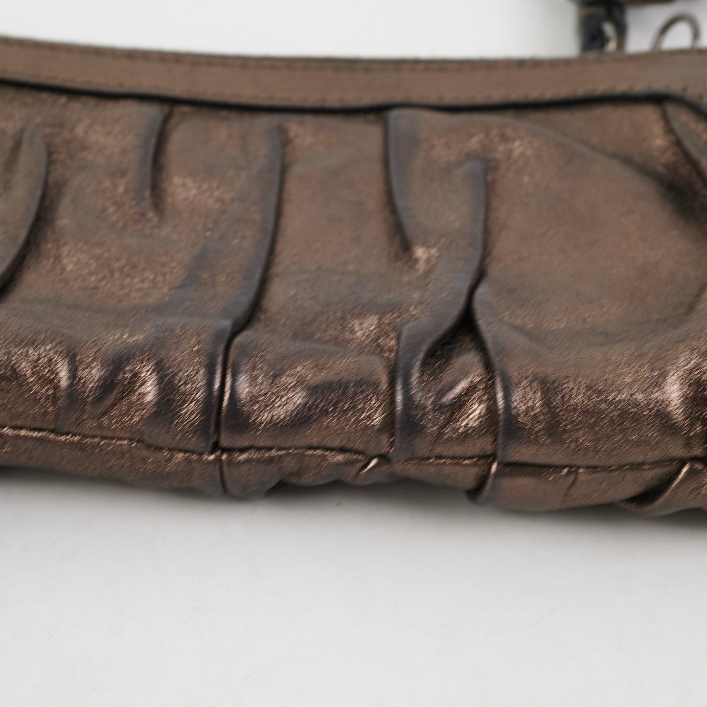 Gucci Metallic Bronze Tassel Pouch