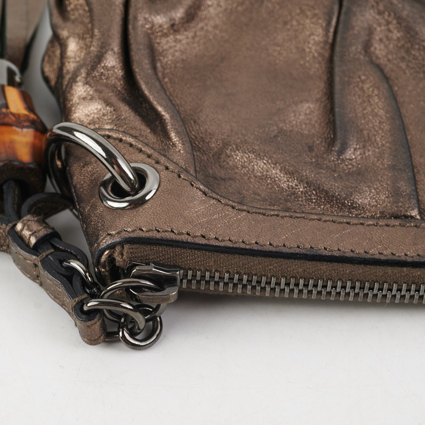 Gucci Metallic Bronze Tassel Pouch