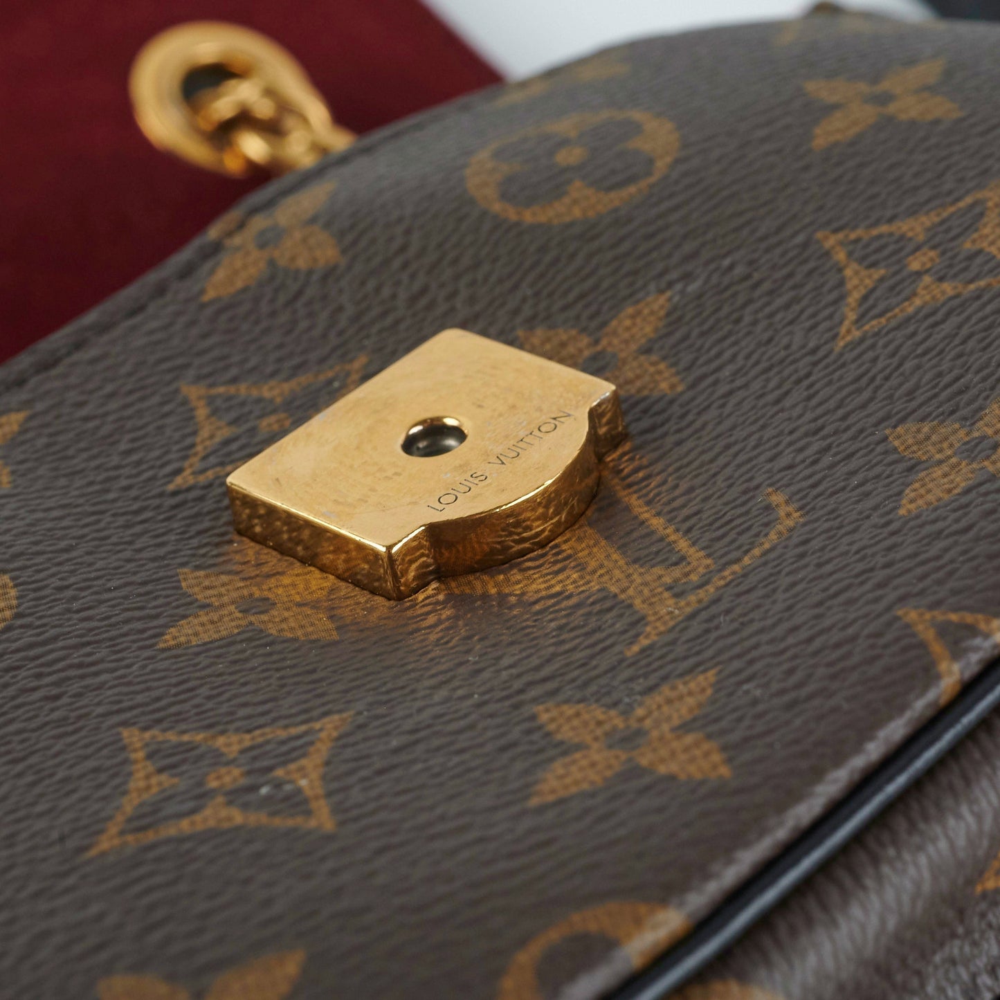 ITEM 27 - Louis Vuitton Passy Monogram