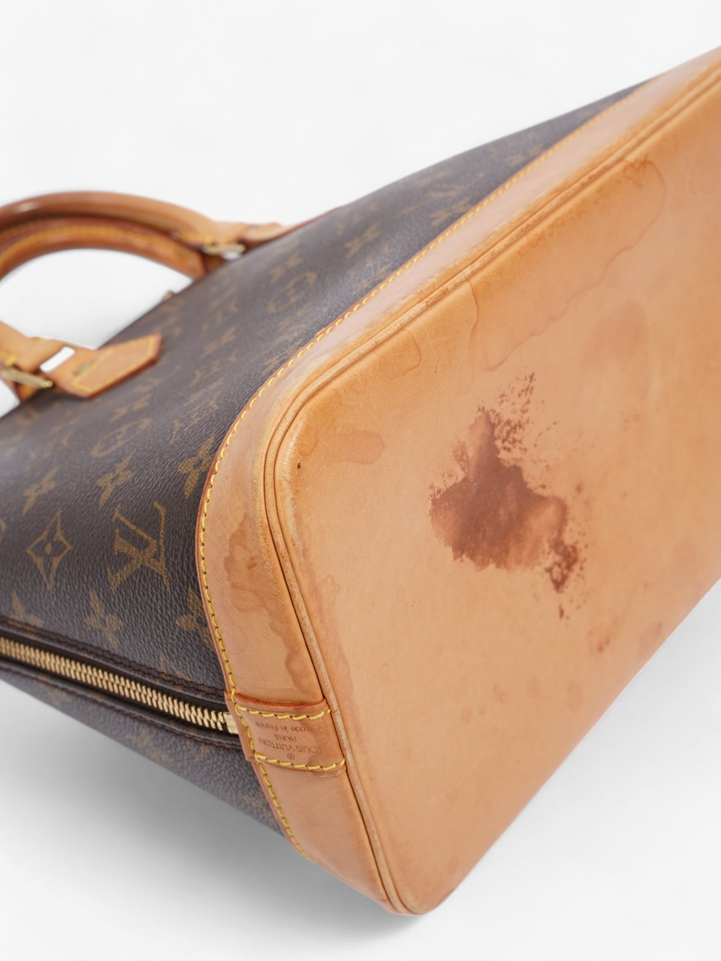 Louis Vuitton Alma Monogram Coated Canvas PM