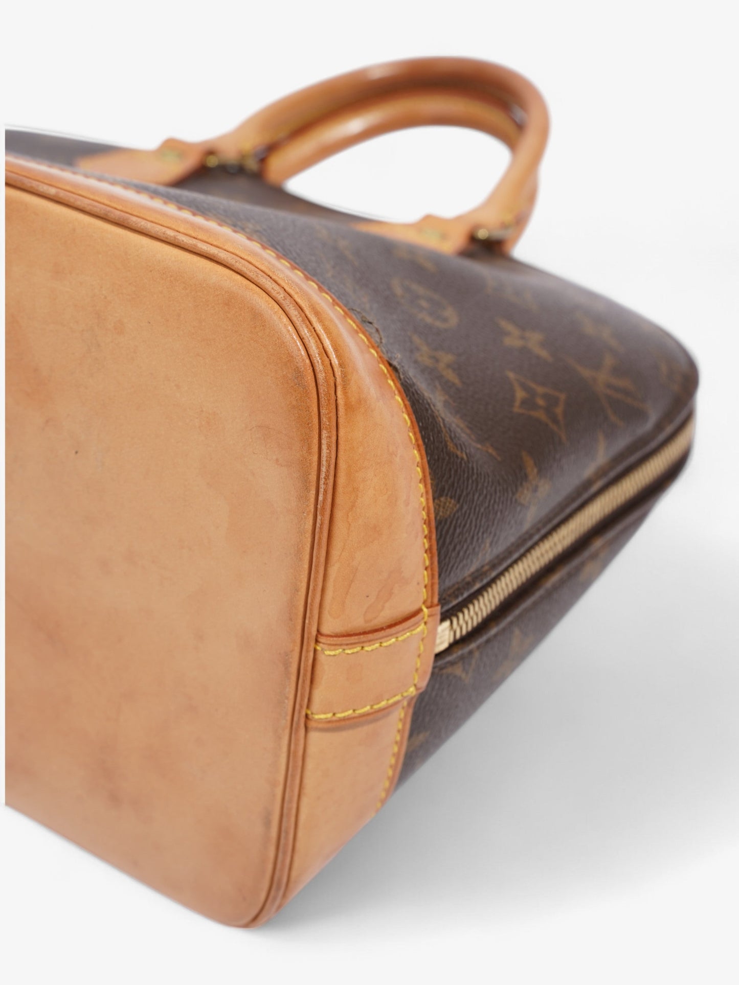 Louis Vuitton Alma Monogram Coated Canvas PM