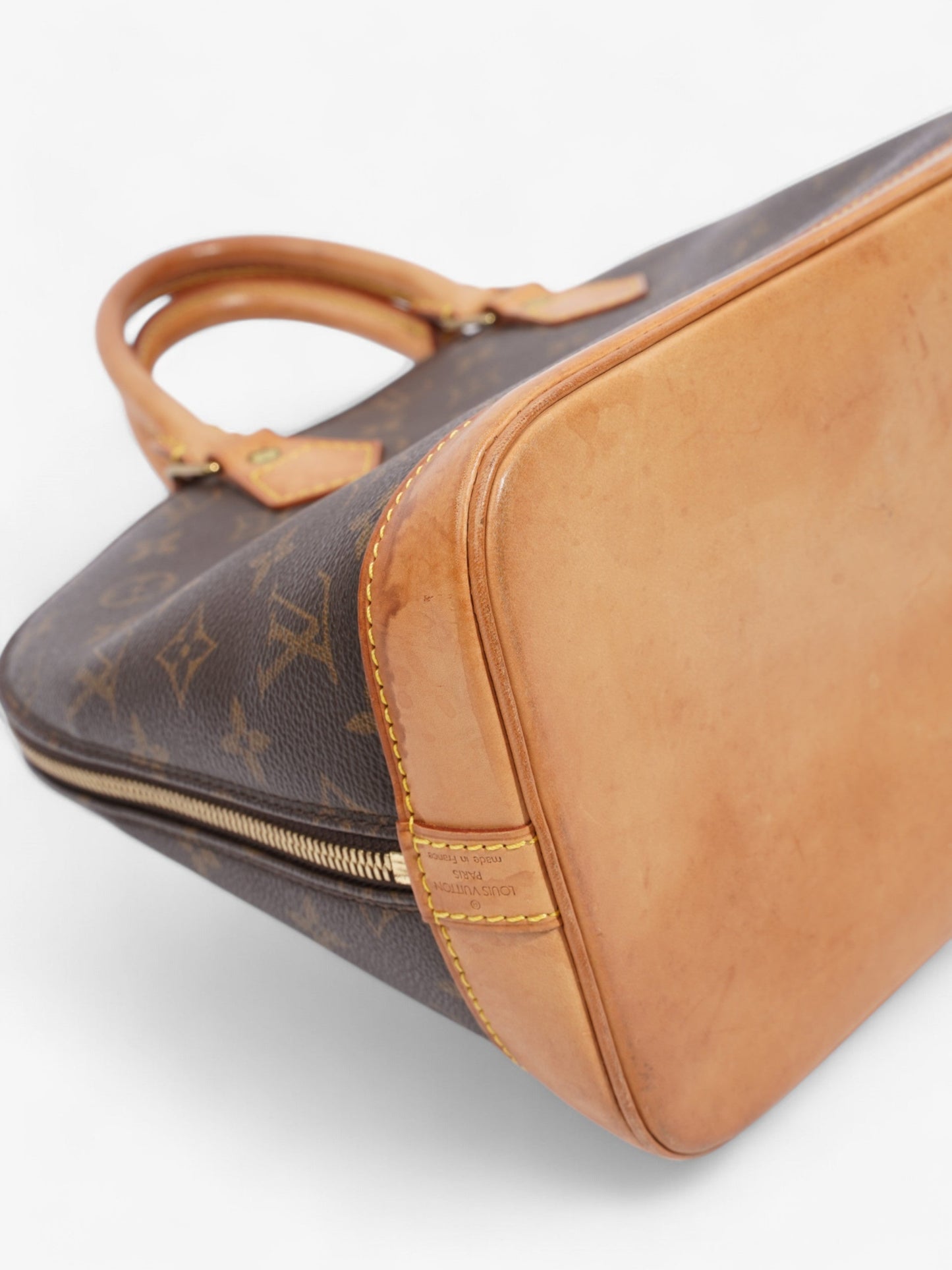 Louis Vuitton Alma Monogram Coated Canvas PM