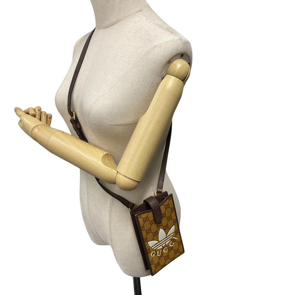GUCCI Shoulder Bag 702203 Coated canvas Brown GG crystal Phone case